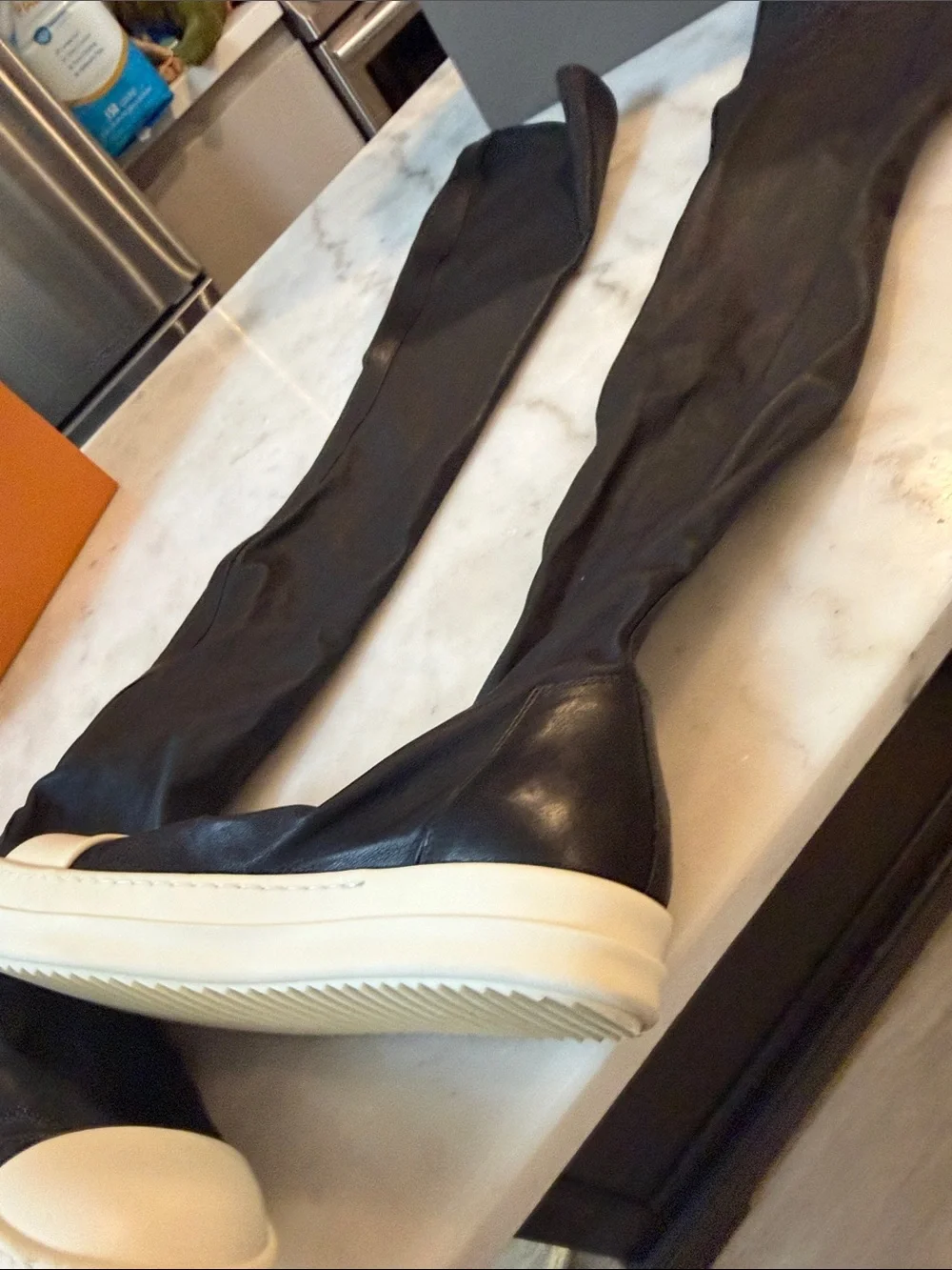Rick Owens black knee-high boots with white platform sole
